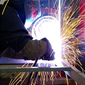 Welder welding at Weldwell Fabrication Ltd, Telford, Shropshire